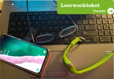 Laptop toetsenbord mobiel, bril, horloge